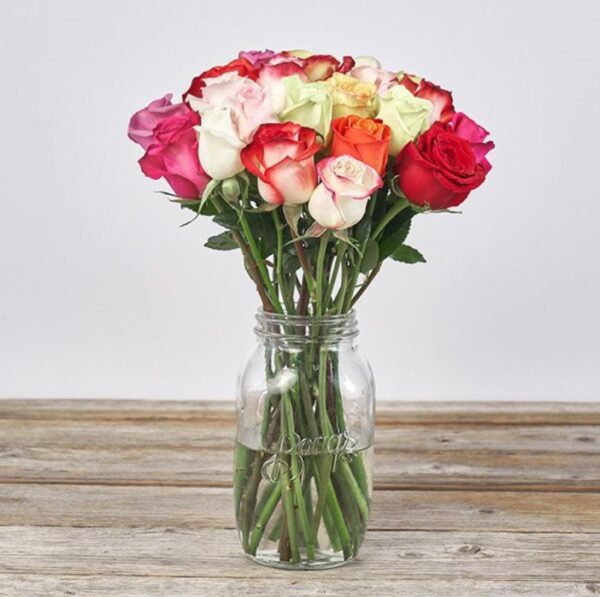 Roses – Exuberance – Mason Vase – Captivating hues like pink, orange, purple, red, and ivory.